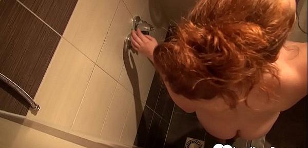 Hottie enjoys washing her pussy while showering